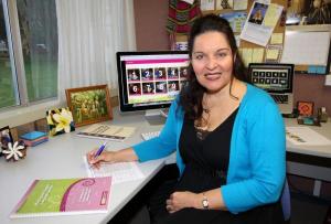 Woman at her desk.